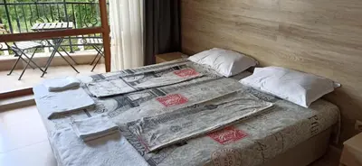 a large bed in a room with at River park in Sunny Beach