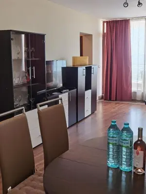 two bottles of water sitting on a table in a kitchen at Свети Зосим in Sozopol