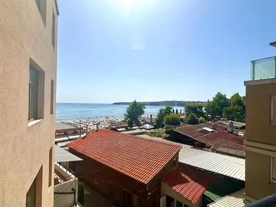 a view of the ocean from a building at Апартаменти Зафи in Sozopol
