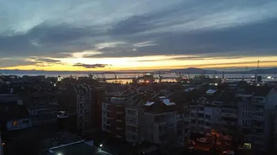 a view of a city at sunset at Апартамент за гости ВО1 in Burgas City