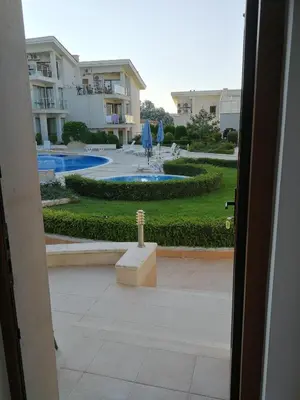 a view of a pool from the door of a building at Wonderful family villa with sea view in Byala
