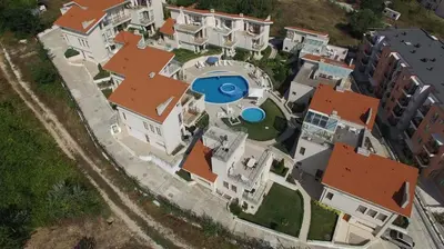 an aerial view of a house with a swimming pool at Wonderful family villa with sea view in Byala