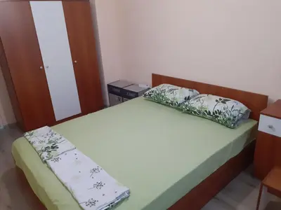 a bedroom with two twin beds in a room at Varna beach in Varna City