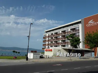 a large building on the side of a street at PARADISO 'В' 310 Private Room Nessebar in Nesebar