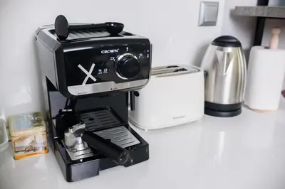a coffee maker sitting on top of a counter at Apartment MARTINI in Burgas City