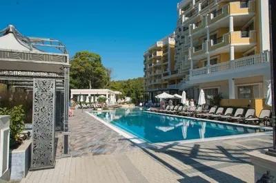a swimming pool in front of a building at Marina Sands Bijou Boutique - excellent choice for travelers visiting Obzor 2-4p in Obzor