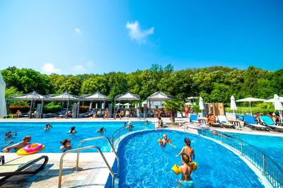 a group of people in a pool at a resort at Marina Sands Bijou Boutique - excellent choice for travelers visiting Obzor 2-4p in Obzor