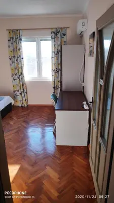 a room with a desk and two windows at UNIQUE LOCATION APARTMENT WITH PARKING in Burgas City