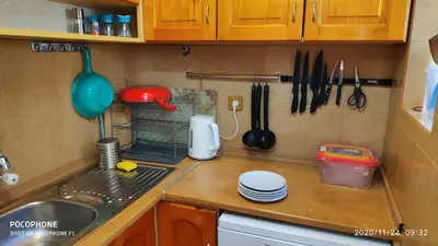 a kitchen counter with a sink and utensils at UNIQUE LOCATION APARTMENT WITH PARKING in Burgas City