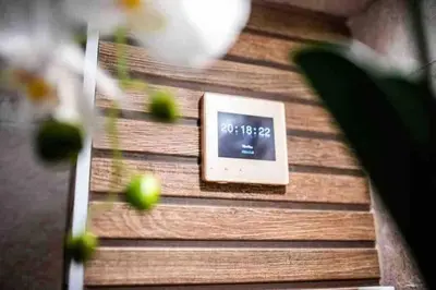 a clock on the side of a wooden wall at A&K COZY ART Studio 1 in Varna City