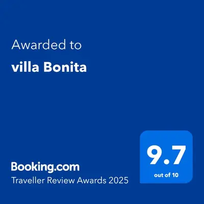 a blue text box with the words awarded to willula bontina at villa Bonita in Sunny Beach