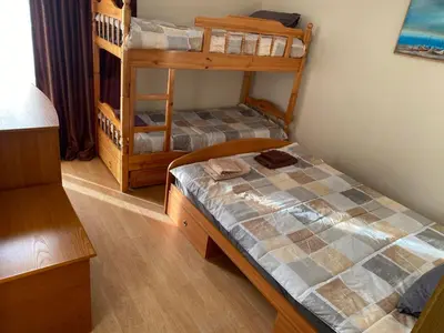 a bedroom with two bunk beds in a room at ELIT 2 APART HOTEL in Sunny Beach