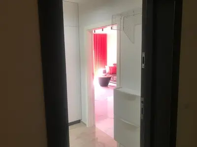 an open door to a room with a living room at Relax Apartment am Südstrand in Primorsko