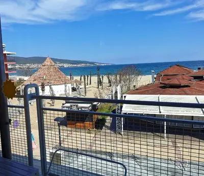 a balcony with a view of a beach and the ocean at Hotel Largo Beach in Sunny Beach