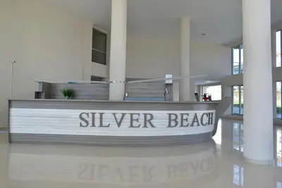 a sign that reads silver beach in a building at Silver beach Studio Byala in Byala