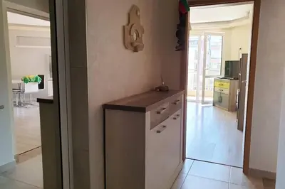 a kitchen with a counter top in a room at Апартамент Диана in Pomorie