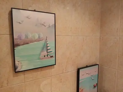 a picture of a sail boat on a wall at Студио Релакс, Ахелой in Aheloy