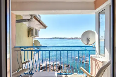 a balcony with a view of the ocean at 1BD Flat with a stunning SEA VIEW in Sozopol by Flаt Manаger in Sozopol