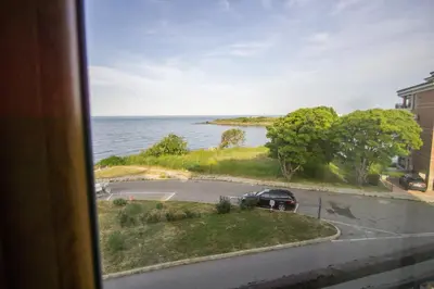 a view of a body of water from a window at Guest apartments STELA in Tsarevo