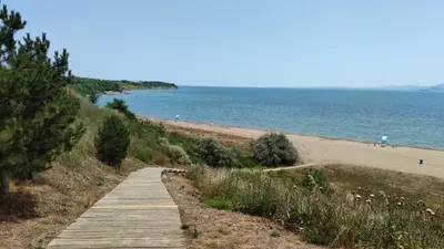 a wooden path leading down to a beach at Day Dream in Burgas City