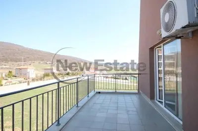 a balcony in a building with a view of a street at Апартамент в Комплексе Сансет Кошарица,Солнечный берег in Kosharitsa