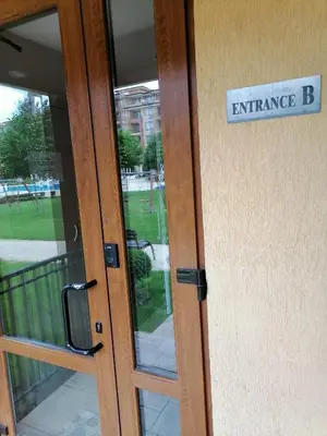 a glass door with a sign that reads entrance b at Bright Studio with Parking & Pool in Sveti Vlas