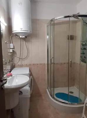 a bathroom with a shower and a toilet and a sink at sea ​​view apartment Sozopol in Sozopol