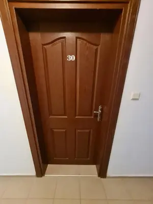 a door with the on it in a room at MitProt Panorama Bay 2 ap 30 in Sveti Vlas