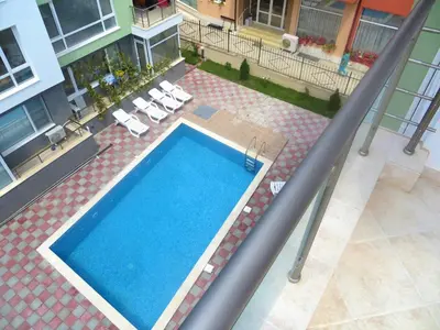an overhead view of a swimming pool on a building at Apartment in Azalia 2 complex in Nesebar
