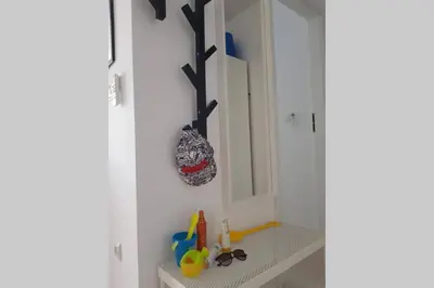 a bathroom with a sink and a mirror at Apartment Beach Kavatsi in Sozopol