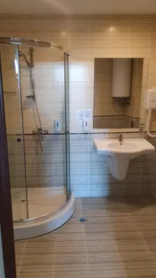 a bathroom with a shower and a sink at Grenada Apartaments in Sunny Beach