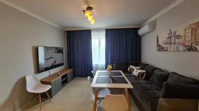 a living room with a couch and a table at Apartment on the beach Ravda in Ravda