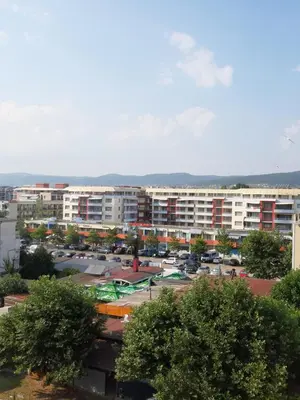a view of a city with buildings in the background at Къща за гости WEST in Sunny Beach