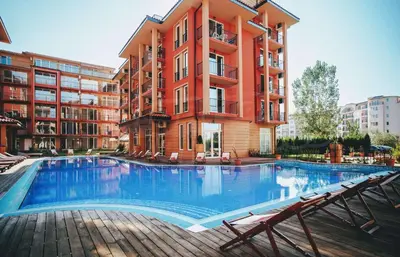 a large swimming pool in front of a building at Sunny View Central - Menada Apartments in Sunny Beach