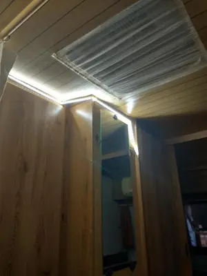 a ceiling with a light on top of a room at каравана Марбея in Chernomorets
