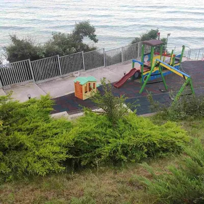 a playground with a slide and a play equipment at Silver A28 in Byala