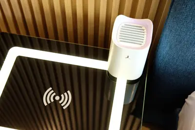 a white air conditioner on the side of a wall at Beachfront Smart Homes by Marty's in Sunny Beach
