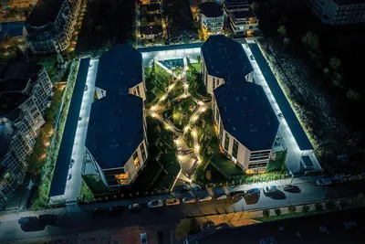 an overhead view of a city at night at Atlantis Atmosphere Apartment in Burgas City