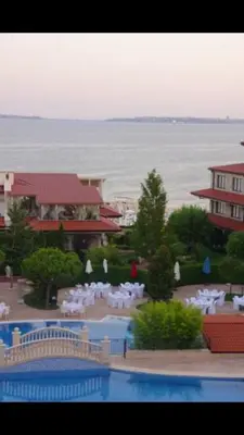 a view of a resort with a swimming pool and the ocean at Casa Real B 5-1 in Sveti Vlas