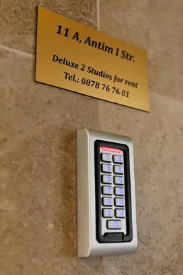 a remote control sitting on the side of a wall at Deluxe 2 Studios City Center in Burgas City