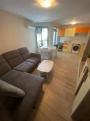 a living room with a couch and a table at VINTAGE Top Centre in Burgas City