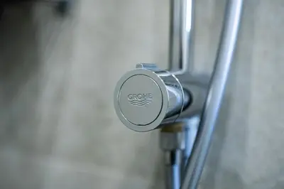 a close up of a door knob on a door at Smart Central Apartment in Varna City