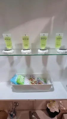 a refrigerator shelf with three shelves with toothbrushes at Apartment Casa del Mar (Dinevi Resort) in Sveti Vlas