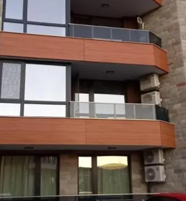a building with a balcony on the side of it at A-19 Sea View Studio-Apartmen Sarafovo in Burgas City