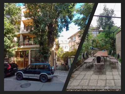 a blue jeep parked in front of a building at Quiet Maisonette \u30e1 Free Parking in Varna City