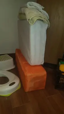 a toilet sitting on top of a platform next to a toilet at The Penthouse in Varna City