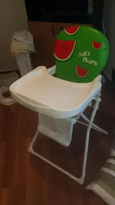 a high chair with a box of watermelon on it at The Penthouse in Varna City
