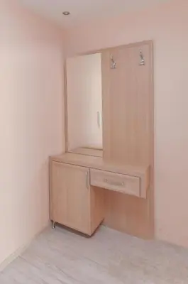 a dressing room with a cabinet and a mirror at Monte Carlo in Sunny Beach