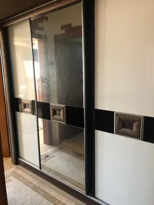 a glass door with a reflection of a room at Dunav Apt.4 in Ravda