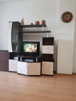 a living room with a tv in a living room at Excelsior Holiday Apartments 91 Sunny Beach Bulgarien Sonnenstrand in Sunny Beach